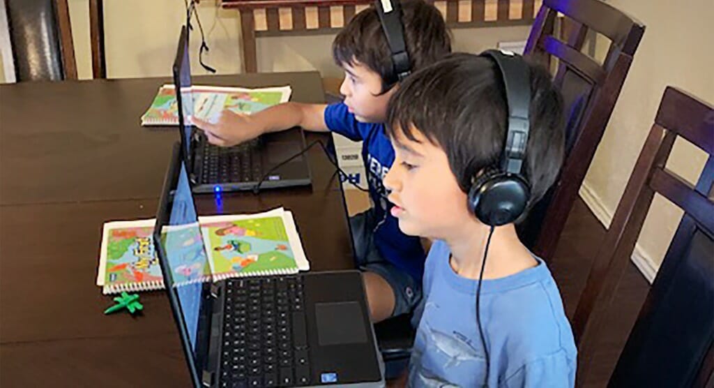 Teacher, Adeline Vargas's, children learning from home.
