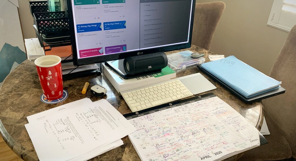 Teacher, May Ng's, kitchen table online classroom.